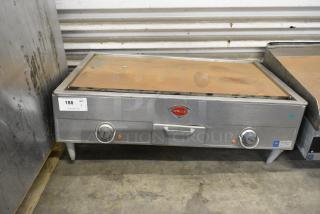 Wells G-19 Stainless Steel Commercial Electric Powered Flat Top Griddle. 208 Volts, 3 Phase.