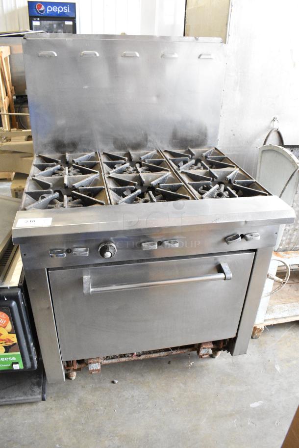 Stainless Steel Commercial Natural Gas Powered 6 Burner Range w/ Oven and Back Splash. - Image 1 of 5
