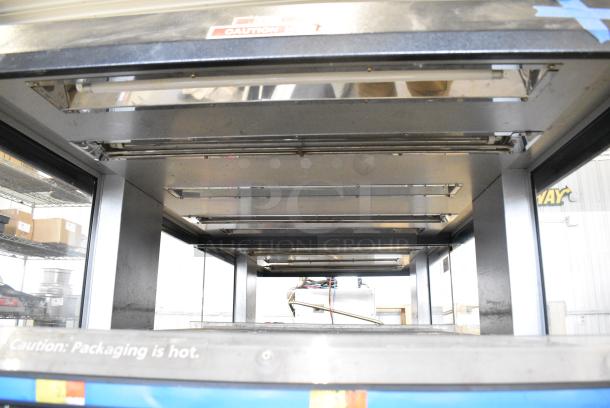 Custom Delis Equipment Stainless Steel Commercial 2 Tier Warming Display Case Merchandiser on Commercial Casters. 208-240 Volts. - Image 2 of 5