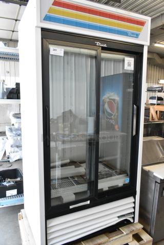 BRAND NEW SCRATCH AND DENT! 2025 True GDM-33-HC-LD Metal Commercial 2 Door Reach In Cooler Merchandiser w/ Poly Coated Racks. 115 Volts, 1 Phase. Tested and Powers On But Does Not Get Cold