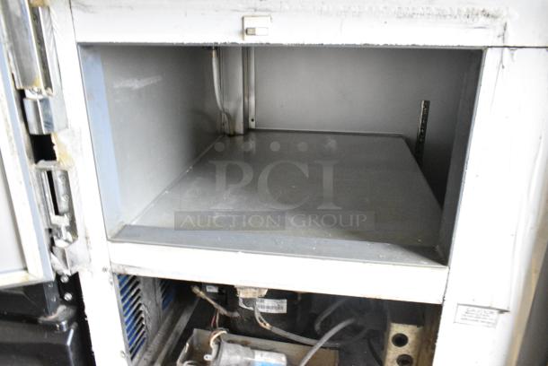 Leader ESPT48 S/C Stainless Steel Commercial Pizza Prep Table w/ Oversized Stone Cutting Board on Commercial Casters. 115 Volts, 1 Phase. Tested and Working! - Image 6 of 9