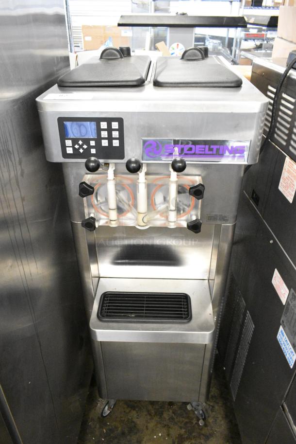 Stoelting F231-109I2 Stainless Steel Commercial Floor Style Water Cooled 2 Flavor w/ Twist Soft Serve Ice Cream Machine on Commercial Casters. 208-230 Volts, 3 Phase. - Image 1 of 10