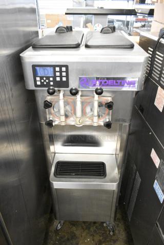 Stoelting F231-109I2 Stainless Steel Commercial Floor Style Water Cooled 2 Flavor w/ Twist Soft Serve Ice Cream Machine on Commercial Casters. 208-230 Volts, 3 Phase.