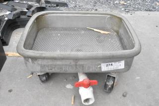 Metal Dolly w/ Drain on Commercial Casters.