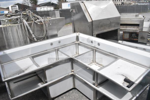 BRAND NEW SCRATCH AND DENT! Regency 600S3242424C Stainless Steel Commercial L Shaped 3 Bay Sink w/ Dual Drain Boards. Bays 24x24x14. Drain Boards 22x25. No Legs. - Image 1 of 7