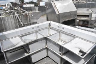 BRAND NEW SCRATCH AND DENT! Regency 600S3242424C Stainless Steel Commercial L Shaped 3 Bay Sink w/ Dual Drain Boards. Bays 24x24x14. Drain Boards 22x25. No Legs.