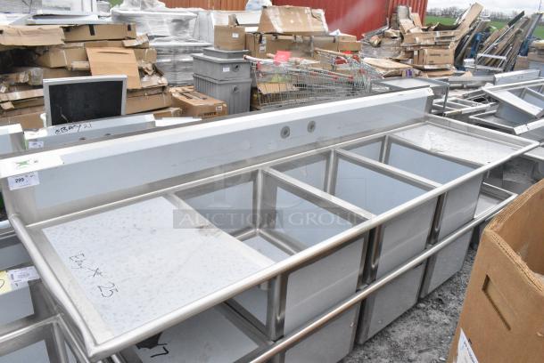 BRAND NEW SCRATCH AND DENT! Regency 600S32028224 115" 16-Gauge Stainless Steel Three Compartment Commercial Sink with 2 Drainboards - 20" x 28" x 14" Bowls. No Legs. - Image 1 of 6
