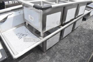 BRAND NEW SCRATCH AND DENT! Regency 600S31620218 88" 16 Gauge Stainless Steel Three Compartment Commercial Sink with Galvanized Steel Legs and 2 Drainboards - 16" x 20" x 12" Bowls. No Legs.
