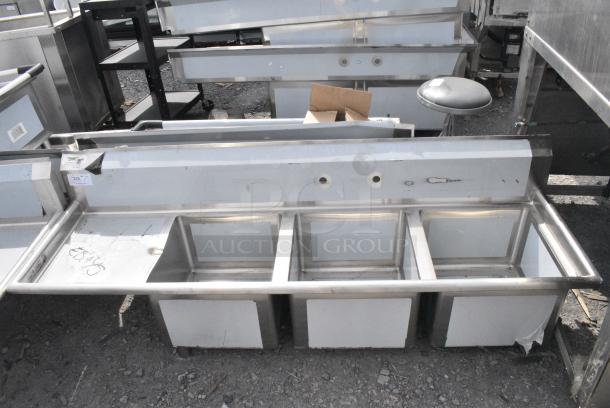 BRAND NEW SCRATCH AND DENT! Regency 600S3171718LFT 76" 16 Gauge Stainless Steel Three Compartment Sink with 1 Drainboard - 17" x 17" x 12" Bowls. No Legs. - Image 1 of 6