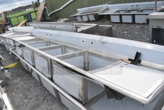 BRAND NEW SCRATCH AND DENT! Regency 600S42424224 94" 16-Gauge Stainless Steel Three Compartment Commercial Sink with 2 Drainboards - 18" x 24" x 14" Bowls. No Legs.