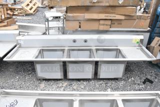 BRAND NEW SCRATCH AND DENT! Regency 600S31818218 94" 16 Gauge Stainless Steel Three Compartment Commercial Sink with Cross Bracing and 2 Drainboards - 18" x 18" x 14" Bowls. No Legs.