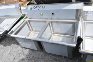 BRAND NEW SCRATCH AND DENT! Regency 600S21717 Regency 41" 16-Gauge Stainless Steel Two Compartment Commercial Sink without Drainboards - 17" x 17" x 12" Bowls. No Legs.