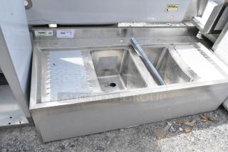 BRAND NEW SCRATCH AND DENT! Regency 600B22148213 2 Bowl Underbar Sink with Faucet and 2 Drainboards - 48" x 21". Missing 2 Legs.