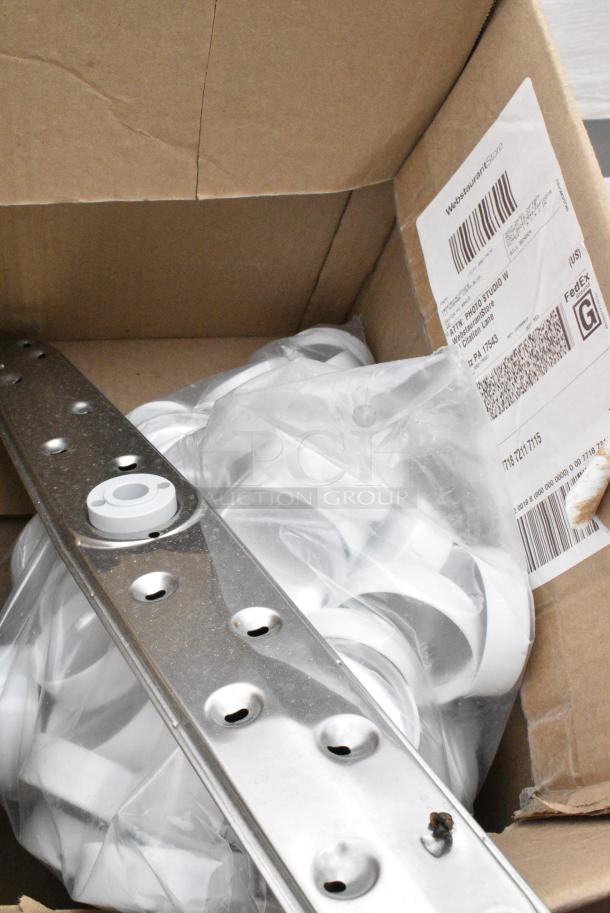 BRAND NEW SCRATCH AND DENT! 63/485 White Dual-Flapper Induction-Lined Spice Lid with 7 Holes - 100/Pack - Image 1 of 7