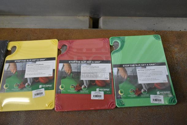 7 Various BRAND NEW Items Including CBG912GN San Jamar Saf-T-Grip® 12" x 9" x 3/8" Green Cutting Board with Hook, CBG912RD San Jamar Saf-T-Grip® 12" x 9" x 3/8" Red Cutting Board with Hook, CNG912YL San Jamar Saf-T-Grip® 12" x 9" x 3/8" Yellow Cutting Board with Hook, 160tcpr54bk Choice 54" Round Black Seamless 100% Spun Polyester Hemmed Cloth Table Cover, 654359016 Boska 9 7/8" x 6" Slate Serving Board, Skimmer, Sambonet Knives. 7 Times Your Bid! - Image 4 of 14