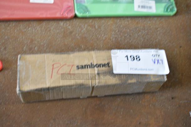 7 Various BRAND NEW Items Including CBG912GN San Jamar Saf-T-Grip® 12" x 9" x 3/8" Green Cutting Board with Hook, CBG912RD San Jamar Saf-T-Grip® 12" x 9" x 3/8" Red Cutting Board with Hook, CNG912YL San Jamar Saf-T-Grip® 12" x 9" x 3/8" Yellow Cutting Board with Hook, 160tcpr54bk Choice 54" Round Black Seamless 100% Spun Polyester Hemmed Cloth Table Cover, 654359016 Boska 9 7/8" x 6" Slate Serving Board, Skimmer, Sambonet Knives. 7 Times Your Bid! - Image 13 of 14