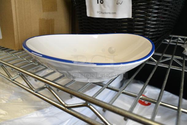 2 BRAND NEW SCRATCH AND DENT! Boxes of 12 GET B-100-W/CB Settlement Bistro 10 oz. White Enamelware Melamine Shallow Bowl with Cobalt Blue Trim. 2 Times Your Bid! - Image 1 of 4