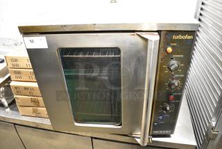 Moffat Turbofan Stainless Steel Commercial Natural Gas Powered Half Size Convection Oven w/ View Through Door, Metal Oven Racks and Thermostatic Controls.