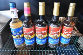 5 BRAND NEW SCRATCH AND DENT! Bottles of Torani Flavor Including Hazelnut, Chocolate Milano, Cinnamon and French Vanilla. 5 Times Your Bid!