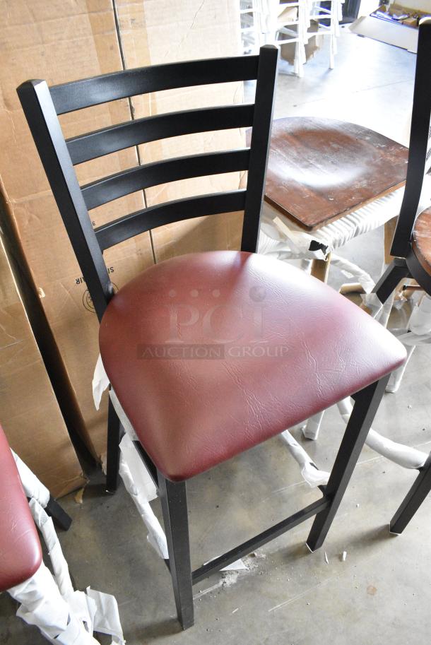 4 BRAND NEW SCRATCH AND DENT! Lancaster Table & Seating 164BMLBVBGKD Black Metal Bar Height Ladder Back Chair w/ Maroon Seat Cushion. 4 Times Your Bid! - Image 2 of 8
