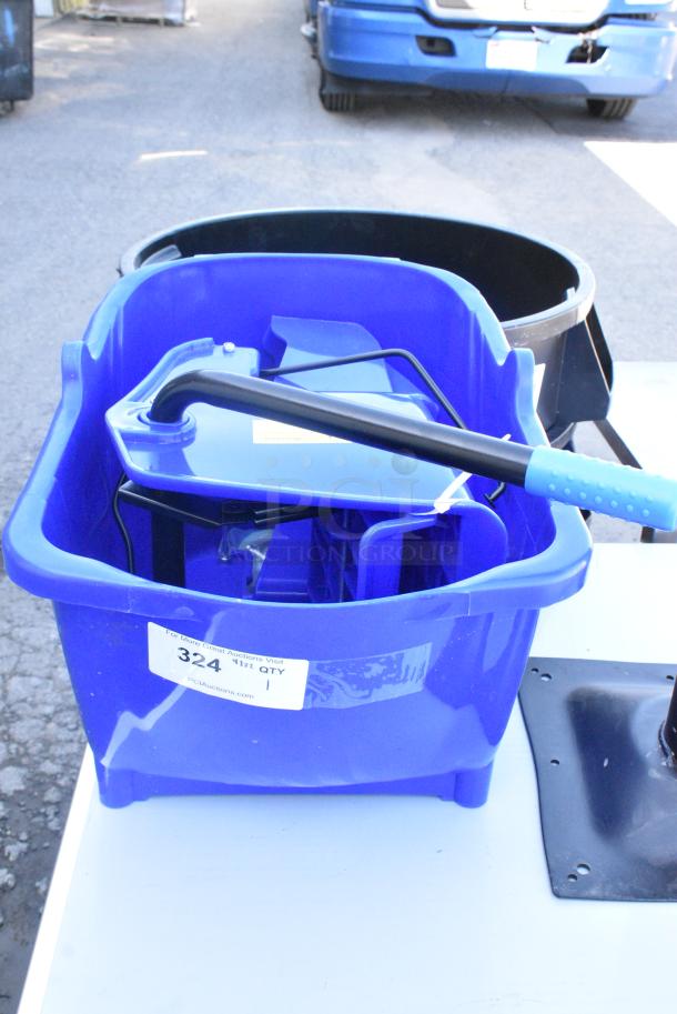 BRAND NEW SCRATCH AND DENT! Lavex Blue Poly Mop Bucket w/ Wringing Attachment and Commercial Casters. - Image 1 of 7