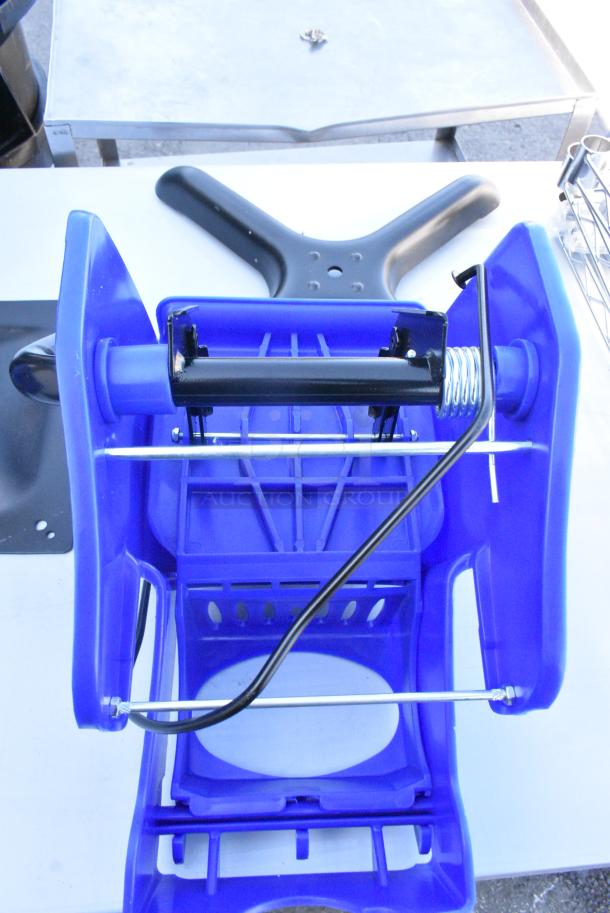 BRAND NEW SCRATCH AND DENT! Lavex Blue Poly Mop Bucket w/ Wringing Attachment and Commercial Casters. - Image 2 of 7