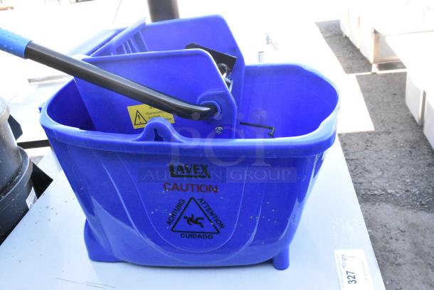 BRAND NEW SCRATCH AND DENT! Lavex Blue Poly Mop Bucket w/ Wringing Attachment and Commercial Casters. - Image 5 of 7