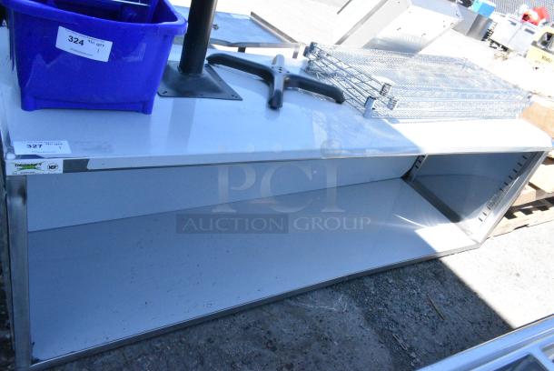 BRAND NEW SCRATCH AND DENT! Regency 600EBT3096 30" x 96" 16 Gauge Type 304 Stainless Steel Enclosed Base Table with Open Front and Adjustable Midshelf - Image 1 of 4