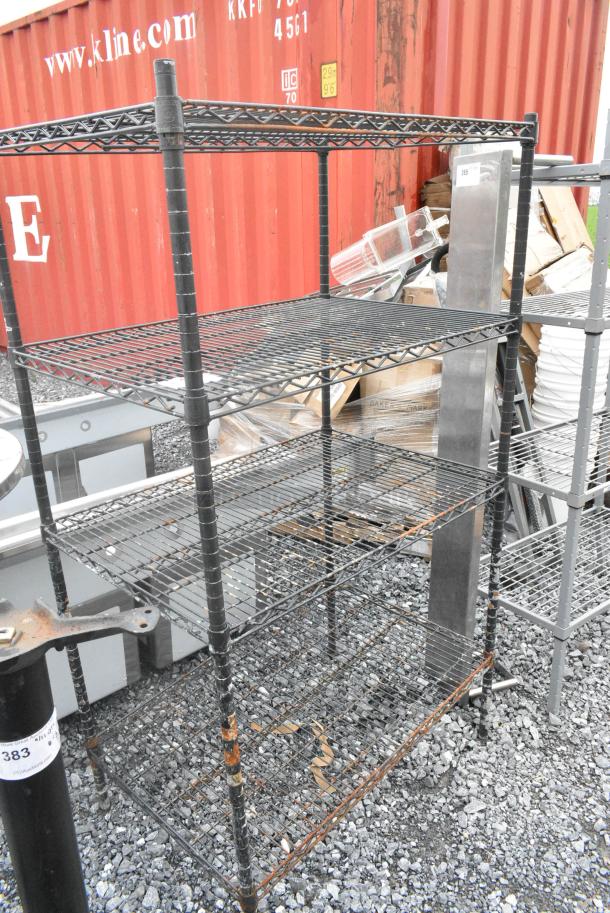 Black Finish 4 Tier Wire Shelving Unit. BUYER MUST DISMANTLE. PCI CANNOT DISMANTLE FOR SHIPPING. PLEASE CONSIDER FREIGHT CHARGES. - Image 1 of 6