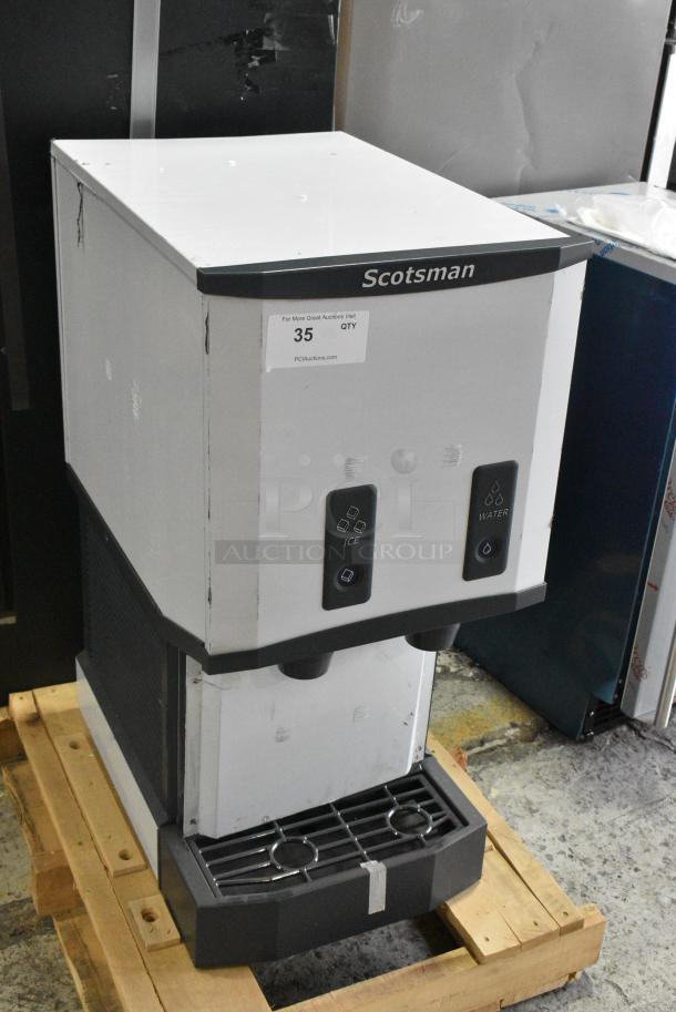 BRAND NEW SCRATCH AND DENT! 2024 Scotsman HID312AB-1A Stainless Steel Commercial Meridian® Countertop Air Cooled Ice Machine and Water Dispenser with Push Button Dispensing - 12 lb. Bin Storage. 115 Volts, 1 Phase. - Image 1 of 7