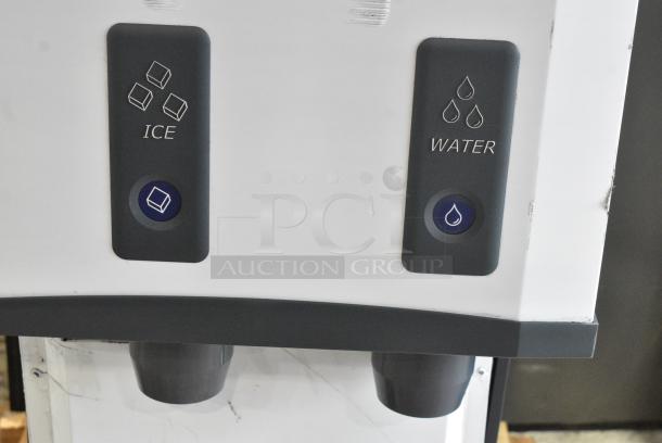 BRAND NEW SCRATCH AND DENT! 2024 Scotsman HID312AB-1A Stainless Steel Commercial Meridian® Countertop Air Cooled Ice Machine and Water Dispenser with Push Button Dispensing - 12 lb. Bin Storage. 115 Volts, 1 Phase. - Image 4 of 7