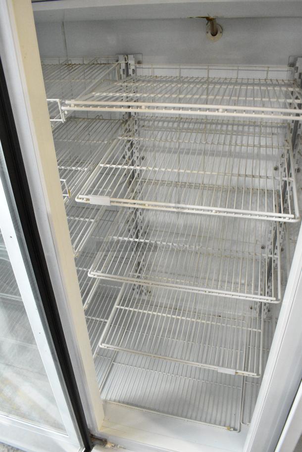 Global ULG80 Metal Commercial 3 Door Reach In Freezer Merchandiser w/ Poly Coated Racks. 115/208-230 Volts, 1 Phase. - Image 5 of 9