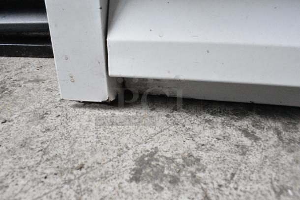 Global ULG80 Metal Commercial 3 Door Reach In Freezer Merchandiser w/ Poly Coated Racks. 115/208-230 Volts, 1 Phase. - Image 7 of 9
