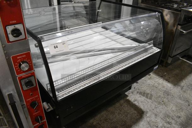 BRAND NEW SCRATCH AND DENT! Econocold OM-IRSSCG Metal Commercial Floor Style Self Contained Island Fridge Curved Glass on Commercial Casters. 115 Volts, 1 Phase. Tested and Working! - Image 2 of 10