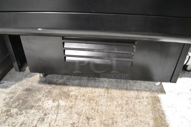 BRAND NEW SCRATCH AND DENT! Econocold OM-IRSSCG Metal Commercial Floor Style Self Contained Island Fridge Curved Glass on Commercial Casters. 115 Volts, 1 Phase. Tested and Working! - Image 7 of 10