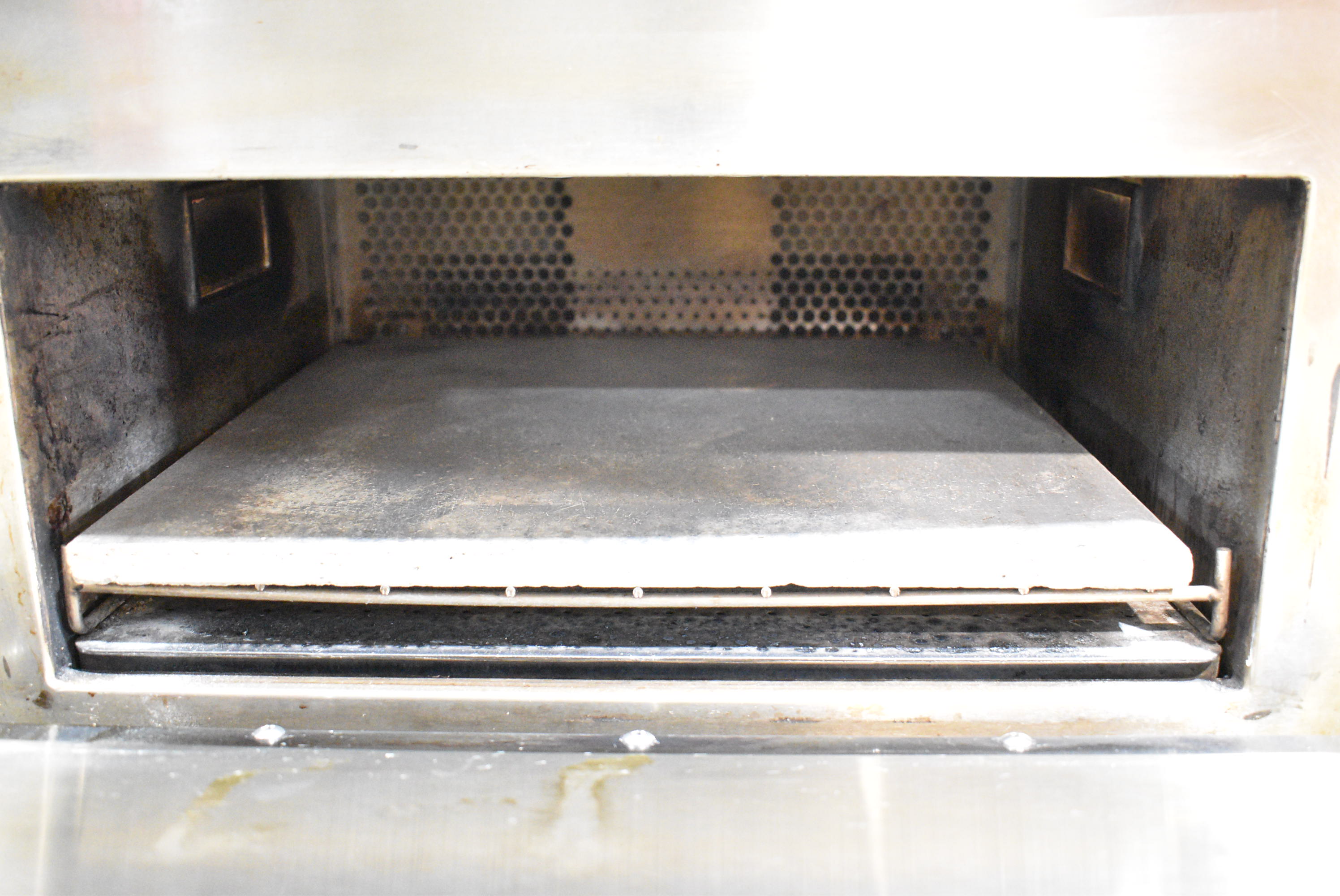 Different style cooking stone in rapid-cook oven