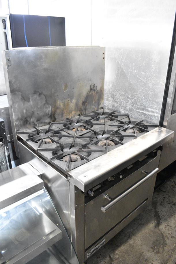 Connerton CN36-6 Stainless Steel Commercial Natural Gas Powered 6 Burner Range w/ Oven and Back Splash. - Image 1 of 8