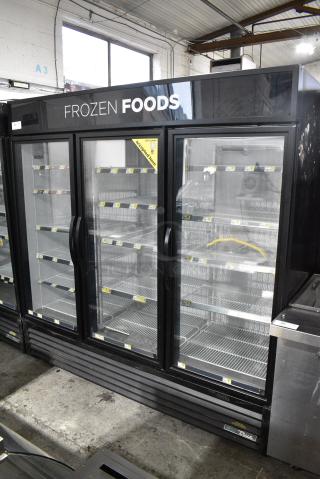 2018 True GDM-72-HC Metal Commercial 3 Door Reach In Freezer Merchandiser w/ Poly Coated Racks. 115/208-230 Volts, 1 Phase. Tested and Working!