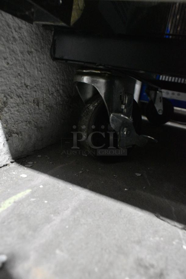 2019 True T-49F-HC Stainless Steel Commercial 2 Door Reach In Freezer w/ Poly Coated Racks on Commercial Casters. 115 Volts, 1 Phase. Tested and Working! - Image 4 of 8
