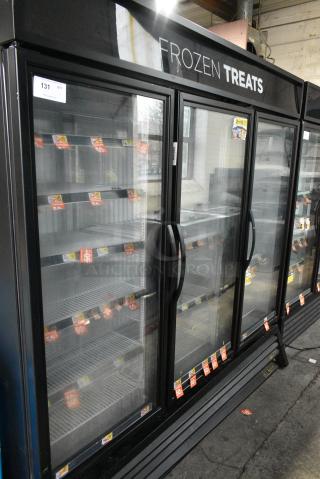 2016 True GDM-72F-HC Metal Commercial 3 Door Reach In Freezer Merchandiser w/ Poly Coated Racks. 115/208-230 Volts, 1 Phase. Tested and Working!