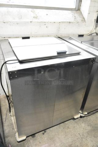 Master-Bilt DC-4D Stainless Steel Commercial Chest Freezer on Commercial Casters. 115/208-230 Volts, 1 Phase. Tested and Working!