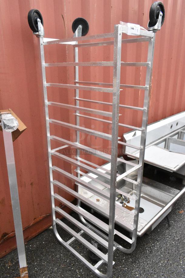 BRAND NEW SCRATCH AND DENT! Metal Pan Transport Rack on Commercial Casters. 1 Caster Needs To Be Reattached. - Image 1 of 4
