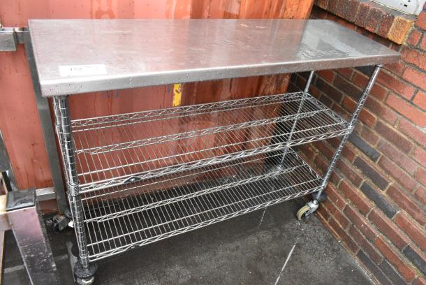 Stainless Steel Table w/ 2 Wire Shelves on Commercial Casters. - Image 1 of 4