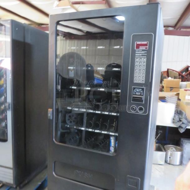 One FSI Snack Vending Machine With Key. Model# 3129. 115 Volt.  35X35X72. - Image 3 of 3