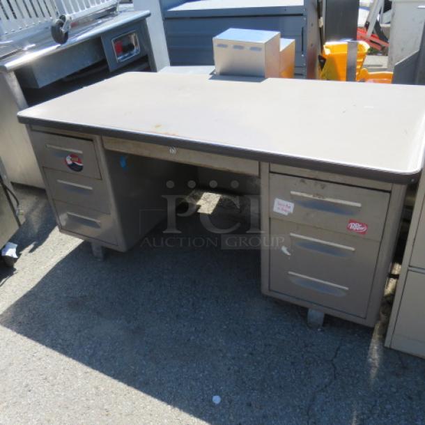 One 4 Drawer Metal Desk. 61.5X31.5X29 - Image 1 of 1