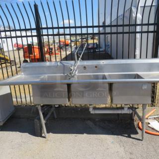 One Stainless Steel 3 Compartment Sink With R/L Drain Boards, Back Splash And Faucet With Hose Sprayer. 103X34X43. Sink 20X28X12.
