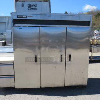 One Delfield 3 Door Cooler With 9 Racks On Casters. Model# 6076-S. 115 Volt. 76X33X80