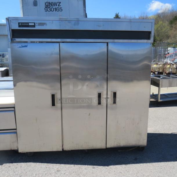 One Delfield 3 Door Cooler With 9 Racks On Casters. Model# 6076-S. 115 Volt. 76X33X80 - Image 2 of 3
