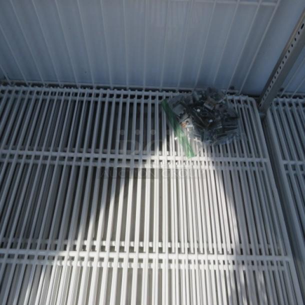 One True 2 Door Glass Display Freezer With 6 Racks. Model# GDM-49F-LD. 115/208-230 Volt. 1 Phase. Unable To Test. 54X30X82. $8018.57 - Image 2 of 2