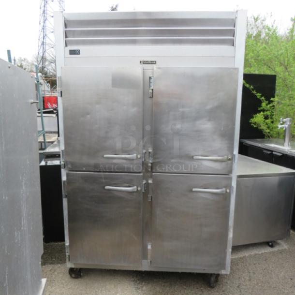 One Traulsen Dutch Door Cooler. Model# G20003. 115 Volt. 52X35X83. $6791.09. - Image 1 of 2